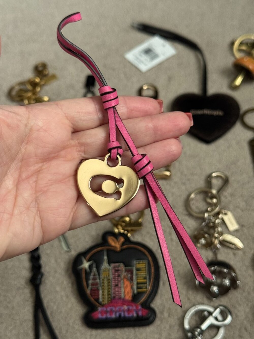 Coach pink leather charm with gold heart "C" cutout, NWOT (from Denim Rowan)